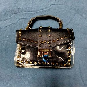 Vinyl and faux leather purse